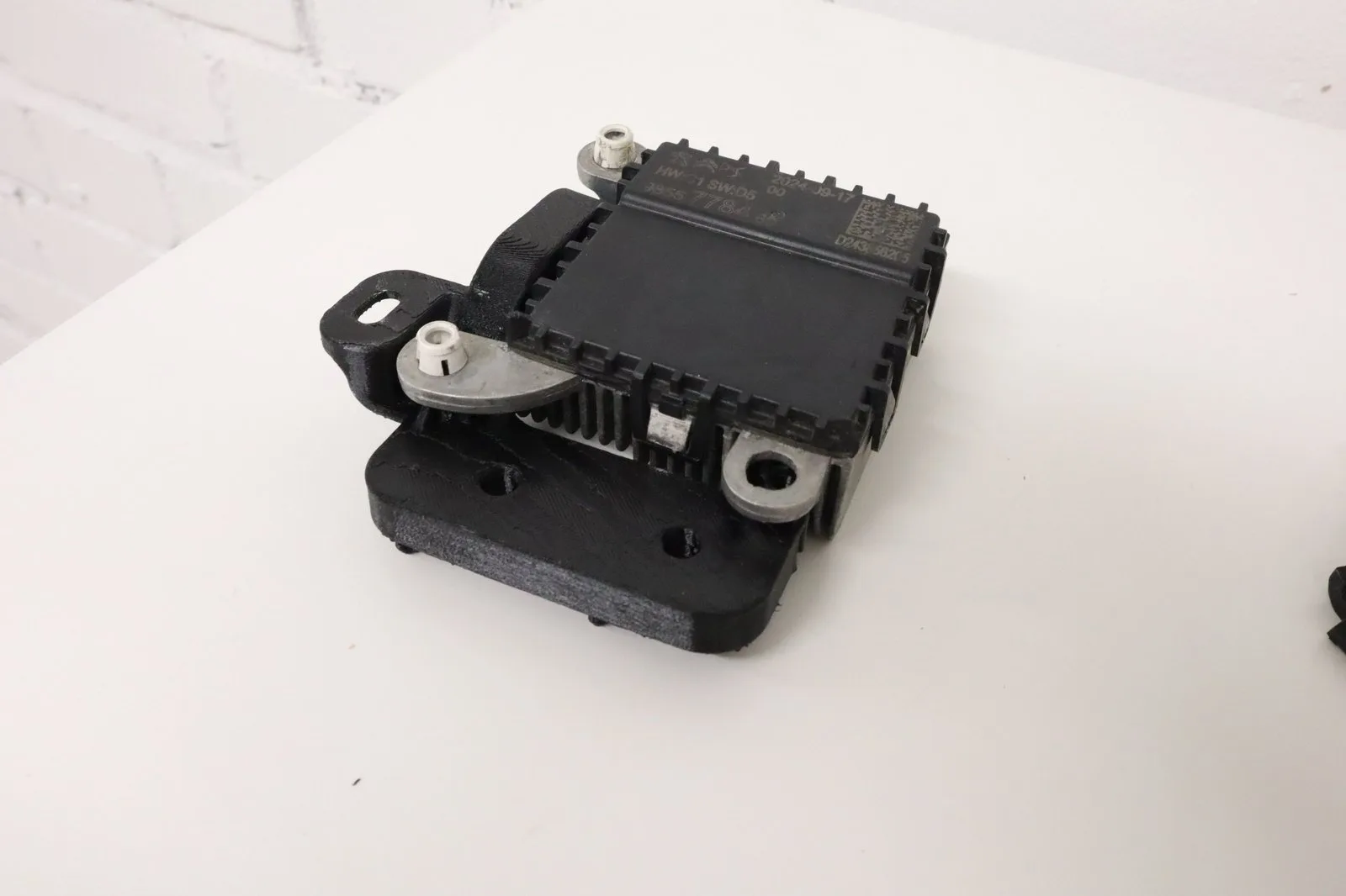 3D spausdinto elektronikos modulio laikiklio tvirtinimo vietos